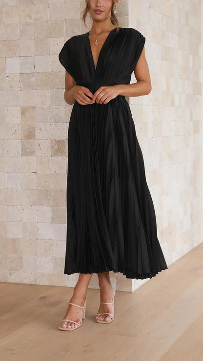 María | Elegante vestido plisado