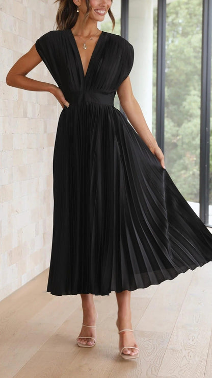 María | Elegante vestido plisado
