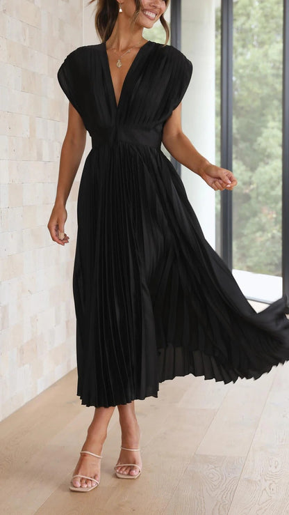 María | Elegante vestido plisado